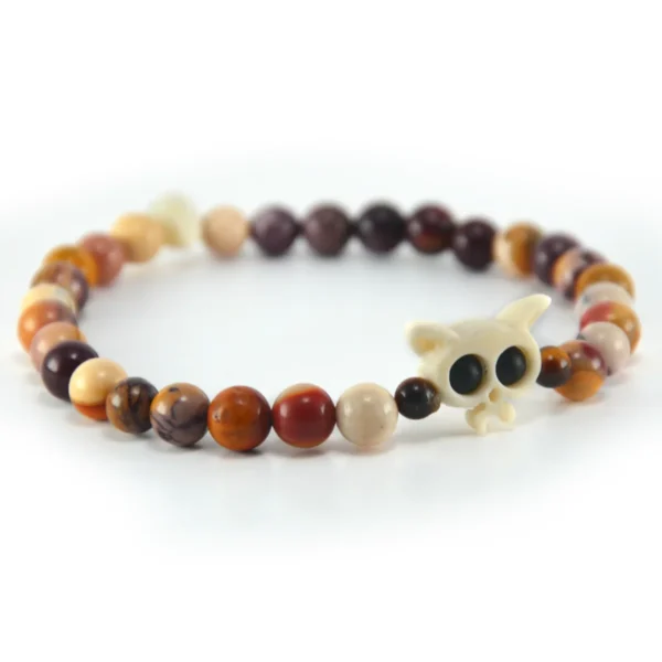 Pulsera de jaspe mookaita natural en tonos tierra y hueso tallado Santiago Rugele