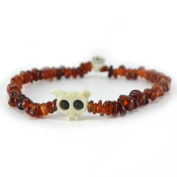 Pulsera de granate natural en chips rojo vino y hueso tallado Santiago Rugeles