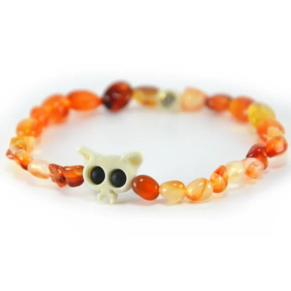 Pulsera de agata natural en tonos fuego naranja y hueso tallado Santiago Rugeles