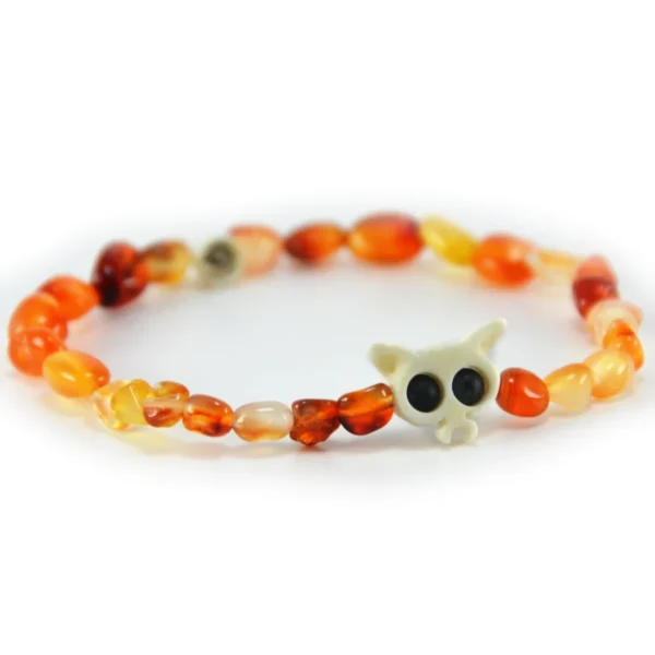 Pulsera de agata natural en tonos fuego naranja y hueso tallado Santiago Rugeles