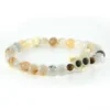 Pulsera de cristal de calcedonia natural y hueso tallado a mano Santiago Rugeles