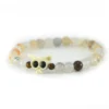 Pulsera de cristal de calcedonia natural y hueso tallado a mano Santiago Rugeles